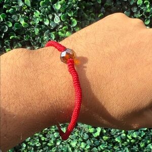 Elegant Red Braided Bracelet with Amber Bead
